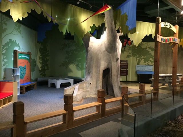 Kids Area with a tree in the middle.