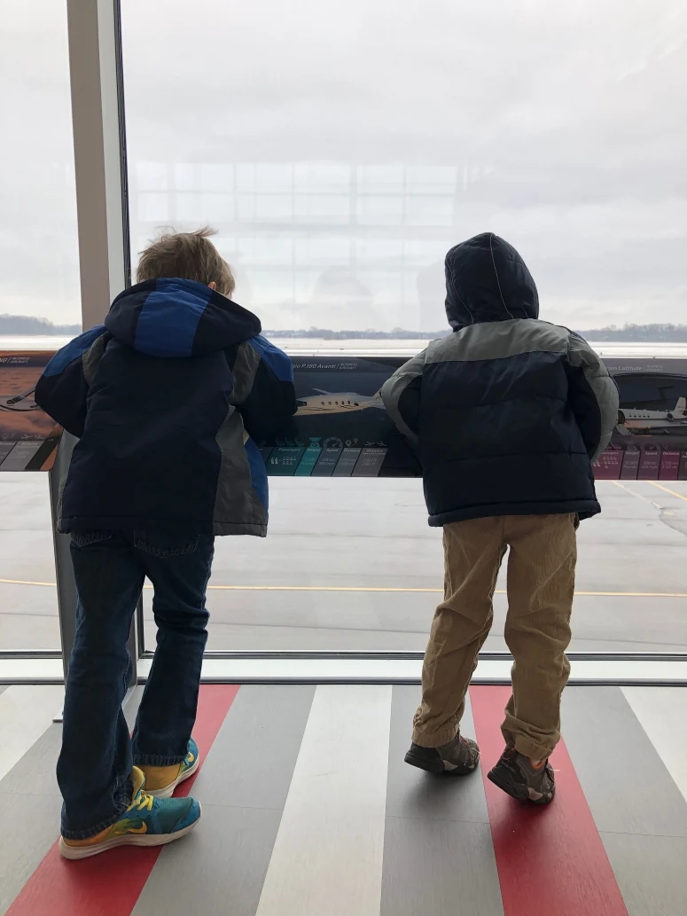 boys watching for planes at OSU airport.