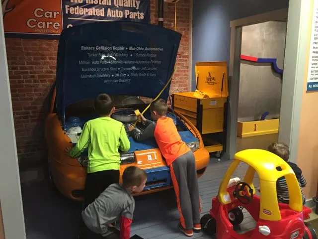kids looking at car at Little Buckeye Museum 