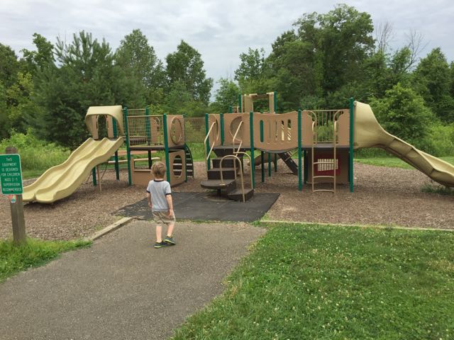 boy at playground at Blendon Woods Metro Park, Columbus, Ohio