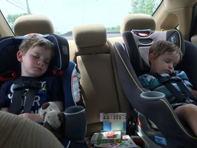 boys asleep in the car after a long day of fun in Bellevue, Ohio