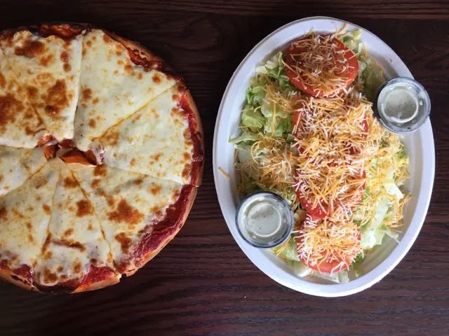Pizza and a salad at Frosty Bar.