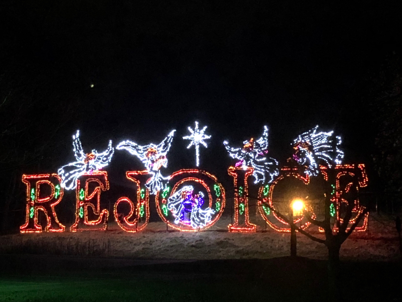 The word "Rejoice" in lights at Butch Bando's Fantasy of Lights in Columbus, Ohio