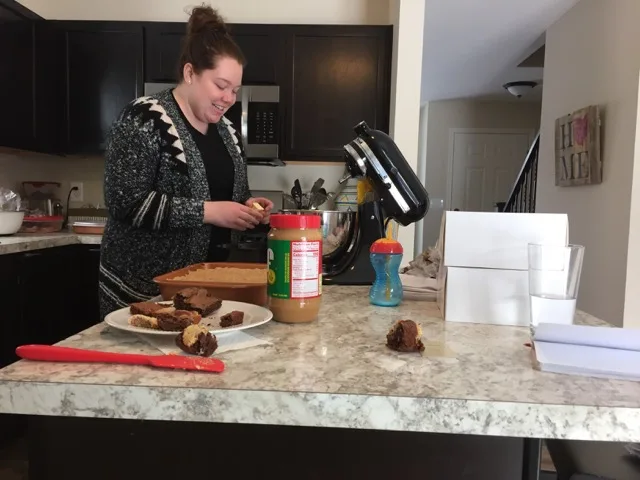 Amanda baking brownies