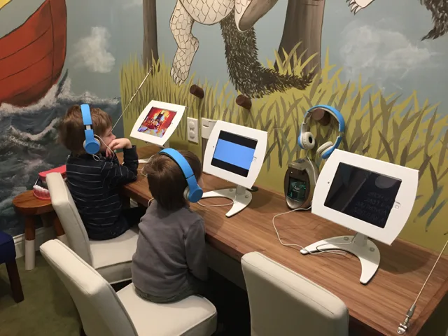 Kids on iPads at River Park Dental