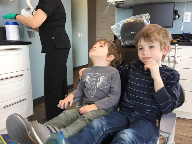 Kids in dental chair at River Park Dental
