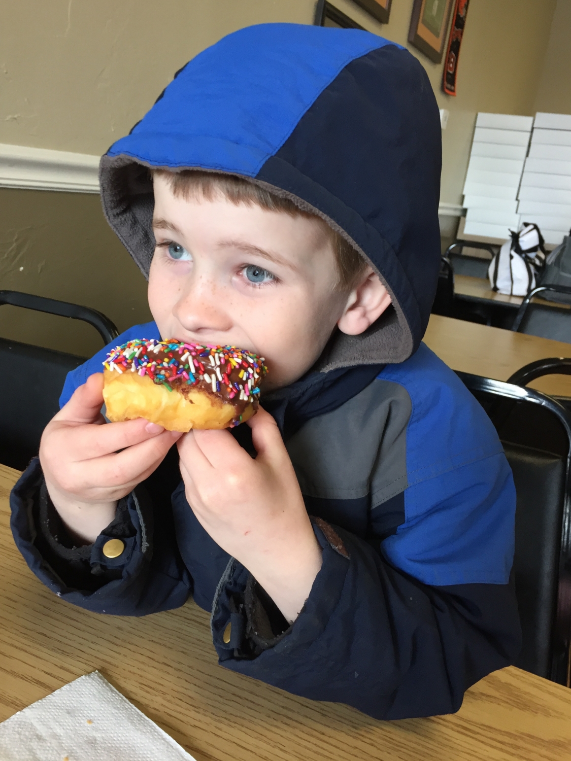 boy eating donut at Stan the Donut Man