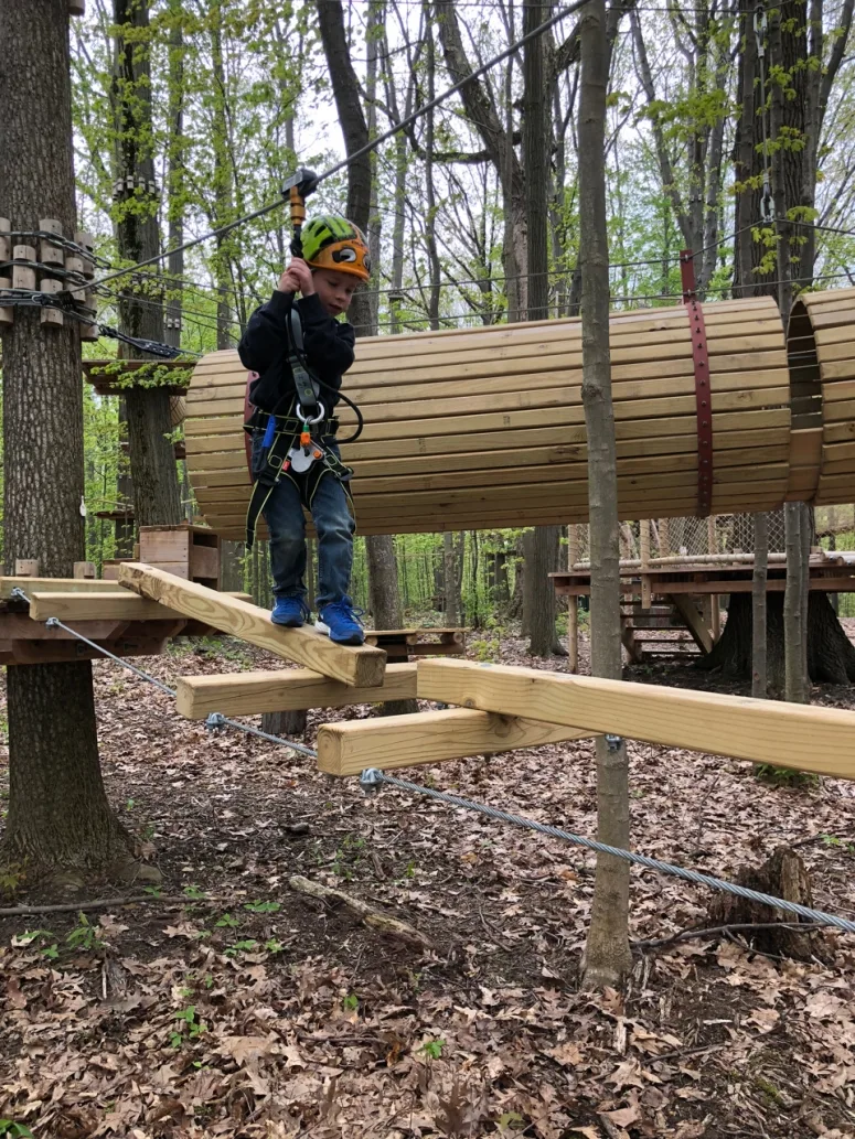 kid on course at Lake Erie Canopy Tours