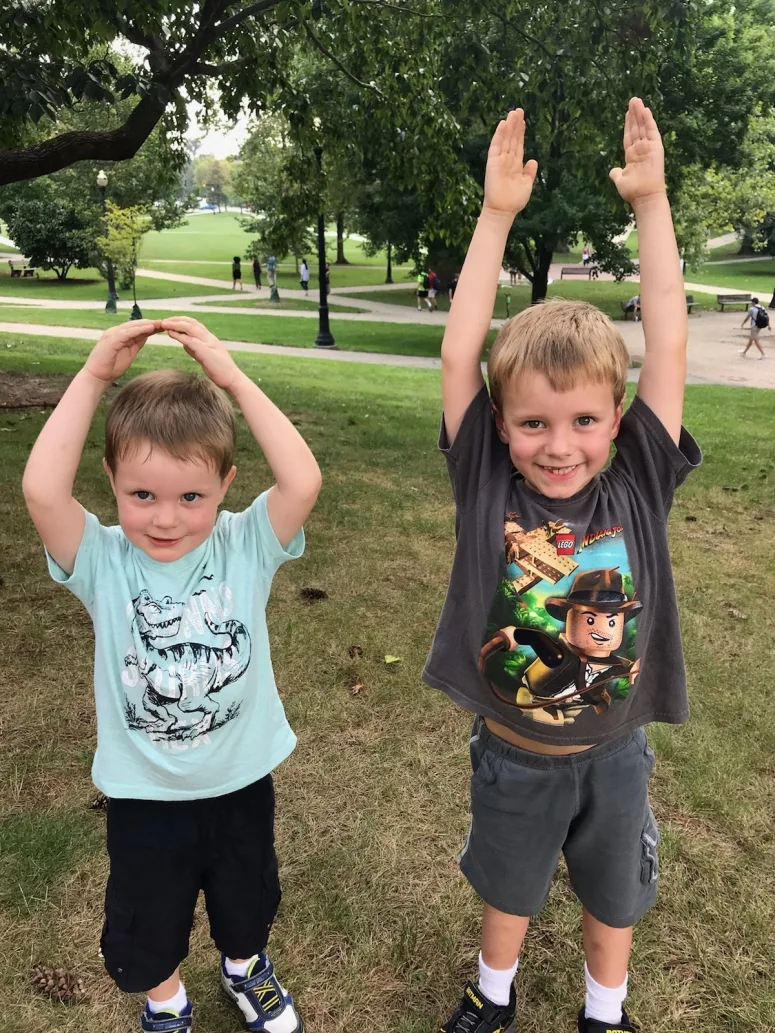 Kids doing "O-H' at The Oval on Ohio State University Campus 