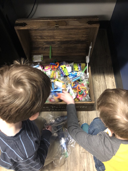 kids picking from the treasure chest at first dentist visit