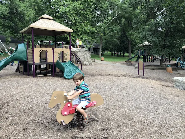 kid playing on equipment at Rising Park in Lancaster, Ohio