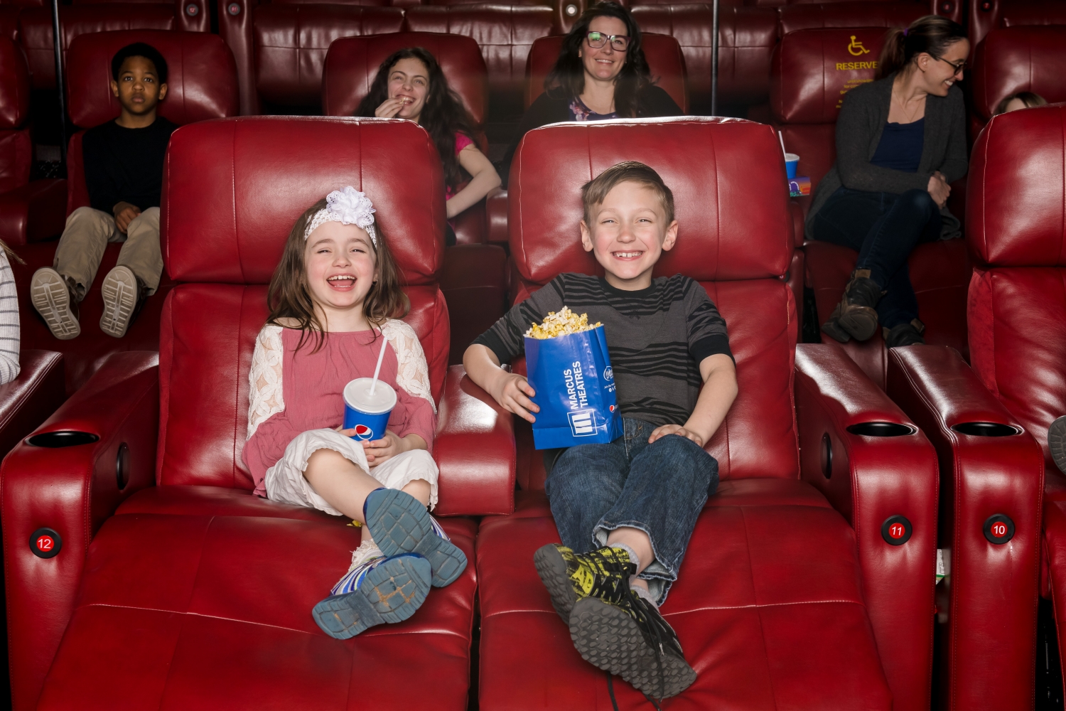 two children at Marcus Theatres Columbus Ohio