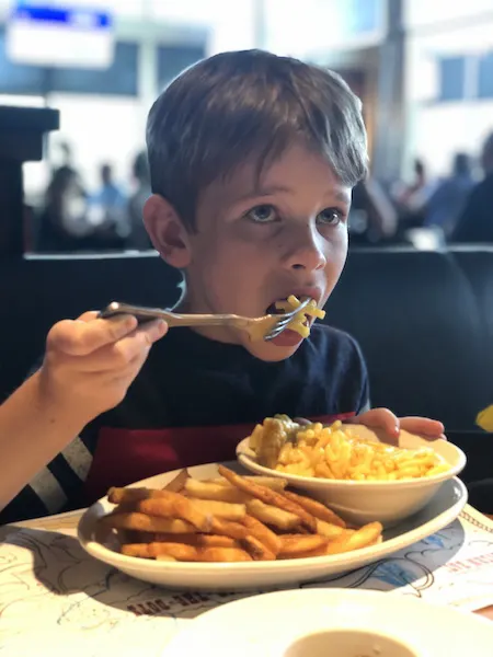 Boy eating at BJ's Restaurant at Easton Town Center