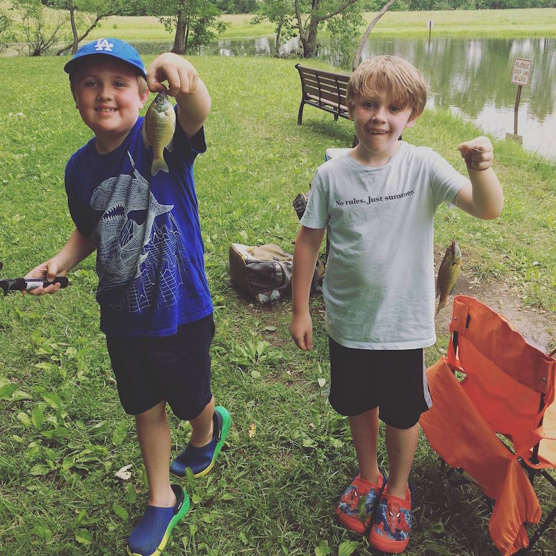 boys holding a fish at Blackridge Community Park