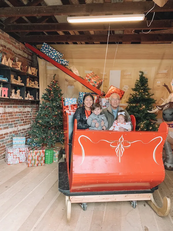 family in a sleigh at Snowflake Castle in Westerville, Ohio