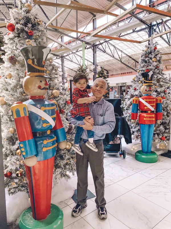 man and child standing by a Nutcracker at Easton Town Center, Columbus, Ohio