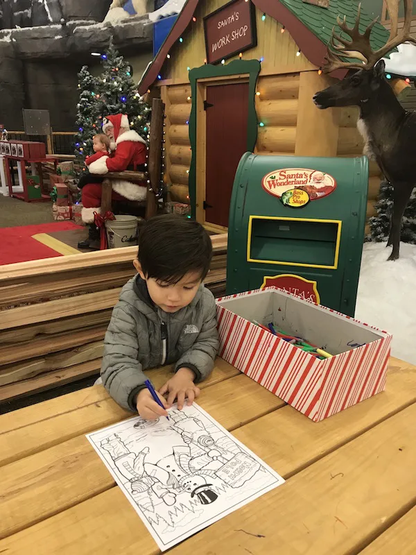 Child coloring a picture at Cabela's in Columbus, Ohio