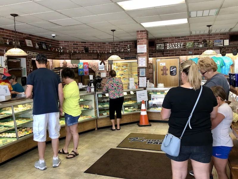people waiting in line inside Kennedy's Bakery in Cambridge Ohio