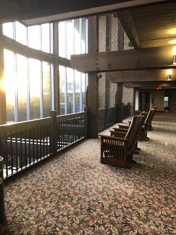 a row of rocking chairs in the sun at Salt Fork State Park Lodge in Guernsey County, Ohio