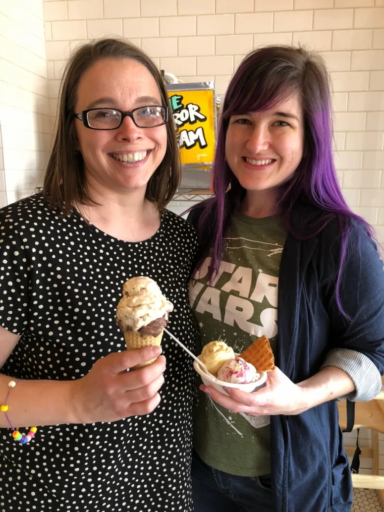 two women holding ice cream at Jeni's Splendid Ice Creams Scoop Shop