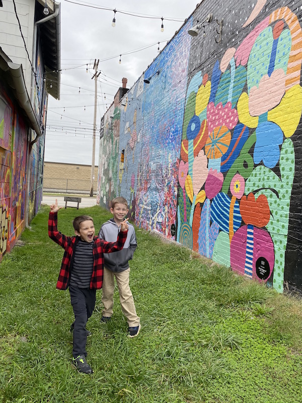 Two Kids in Mural Alley at 934 Gallery in Columbus