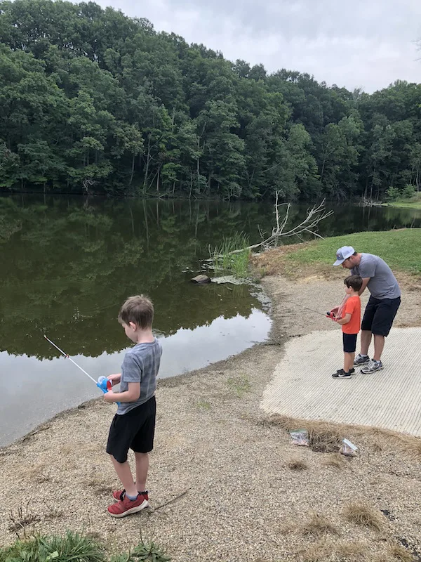 dad and two boys fishing at Mt. Gilead Lake