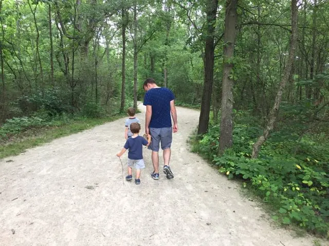 Two boys and dad walking Darby Creek Greenway Trail