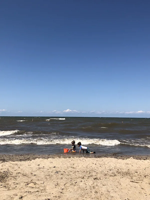 boys playing on the Lake Erie Beach in Vermilion Ohio
