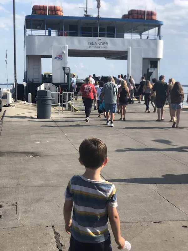 boy watching the ferry at Miller Boatline
