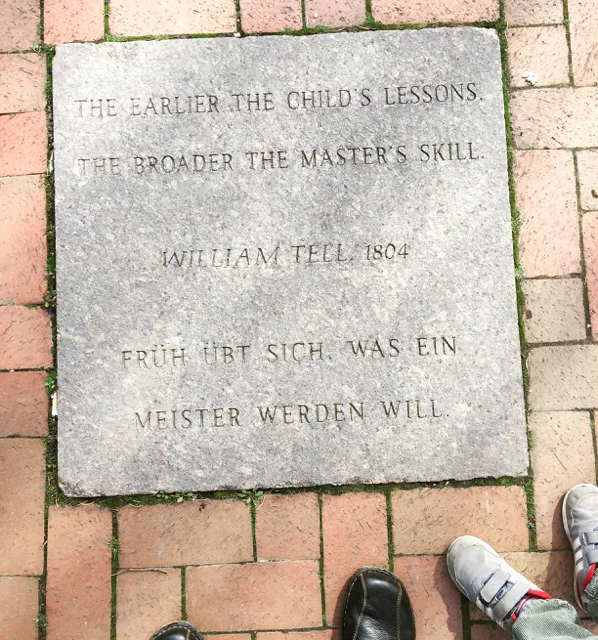 A quote by William Tell carved into the path in Schiller Park.