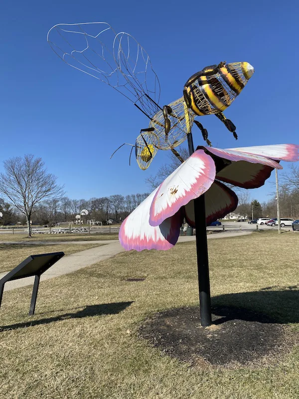 large metal honey bee structure in Academy Park in Gahanna.