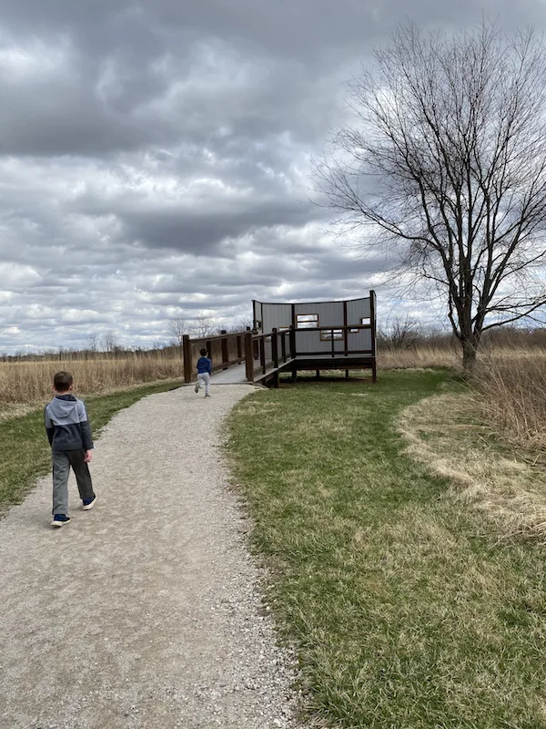 two boys on the path to the bird blind at Pickerington Ponds Metro Park.