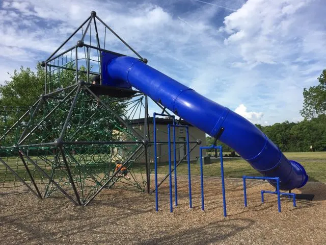 tall blue slide on the playground at Scioto Grove Metro Park.