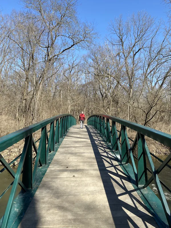 boy walking on the bridge over Big Walnut Creek in Gahanna, Ohio.