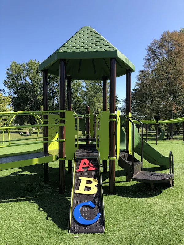 toddler play structure in the park.