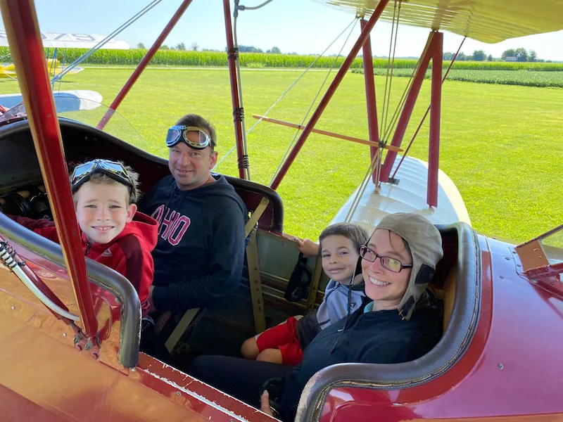 Family inside a bi-plane in Greene County, Ohio.