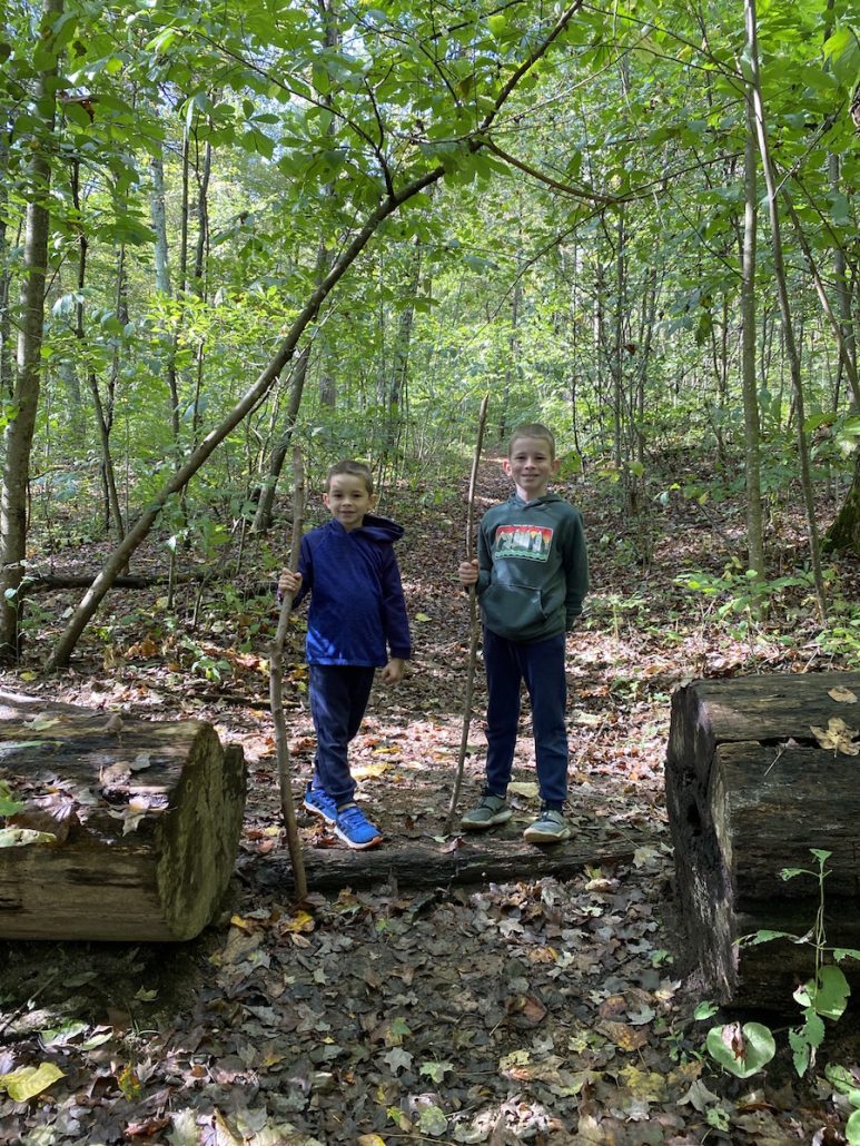 Two boys hiking at Fort Hill Earthworks. 