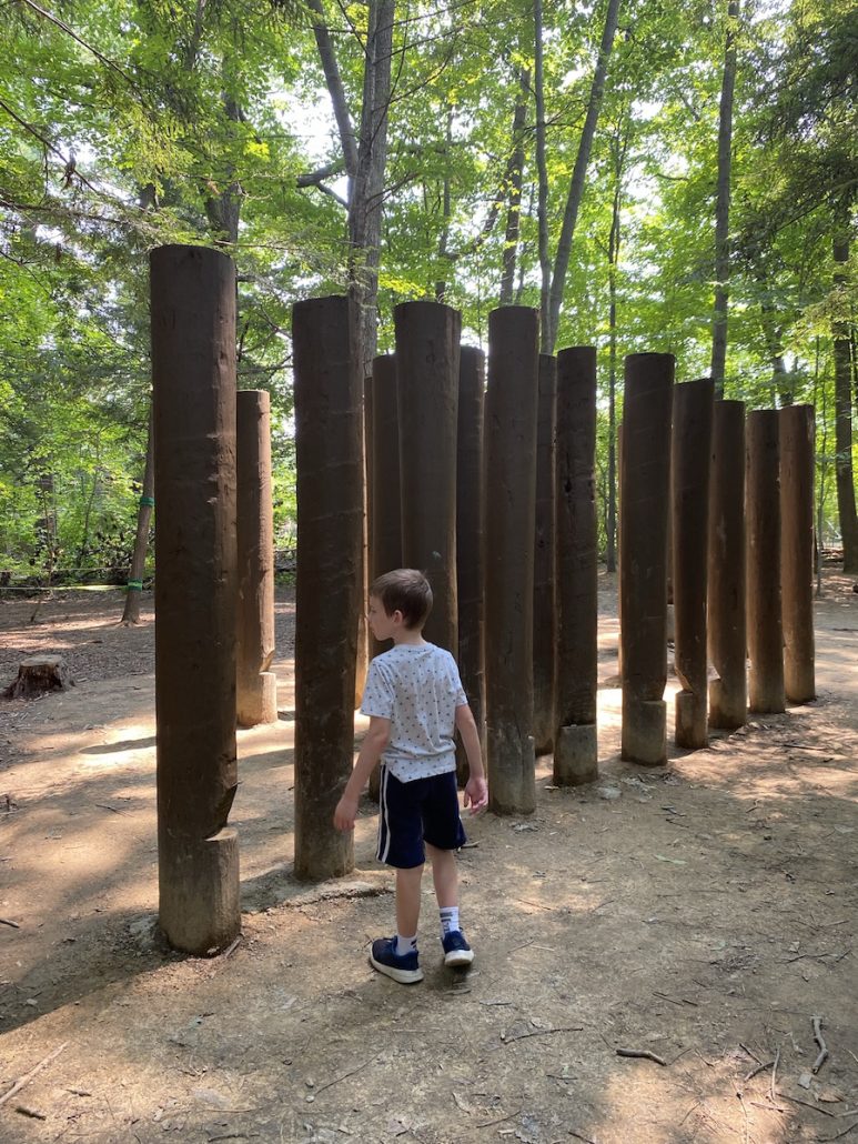 Boy exploring the Adventure Play area at Jordan Creek Park in Painesville, Ohio.