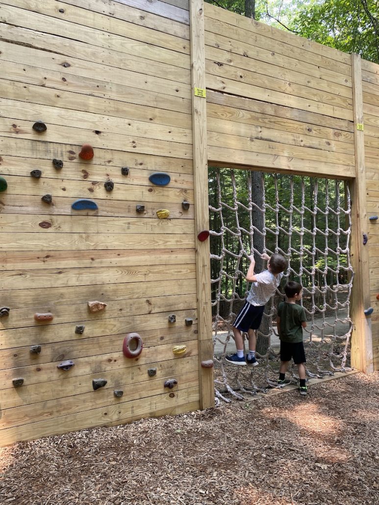 Boys climbing ropes at Jordan Creek Park Adventure Play.