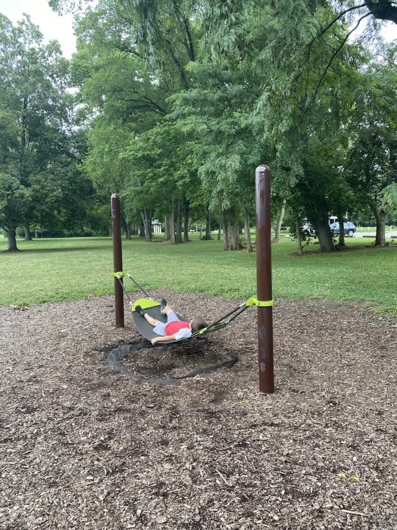 Boy on the playground in Whetstone Park.