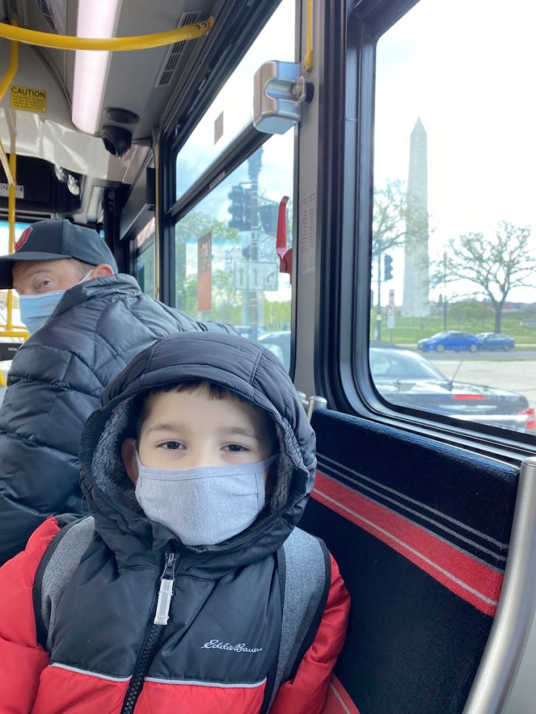 Boy riding the DC Circulator Bus in Washington, D.C.