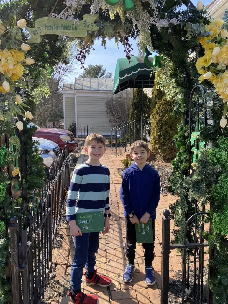 Two boys participating in the Irish Fairy Door Trail in Dublin, Ohio.