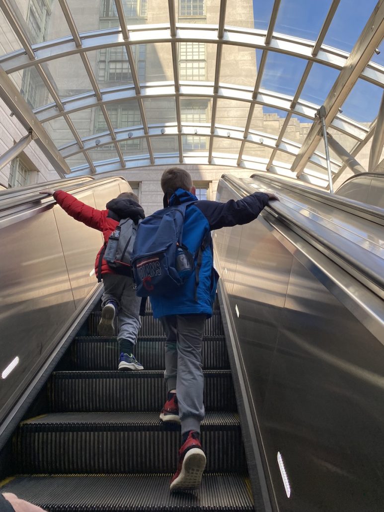 Boys on an escalator out of the Metro in Washington, D.C.