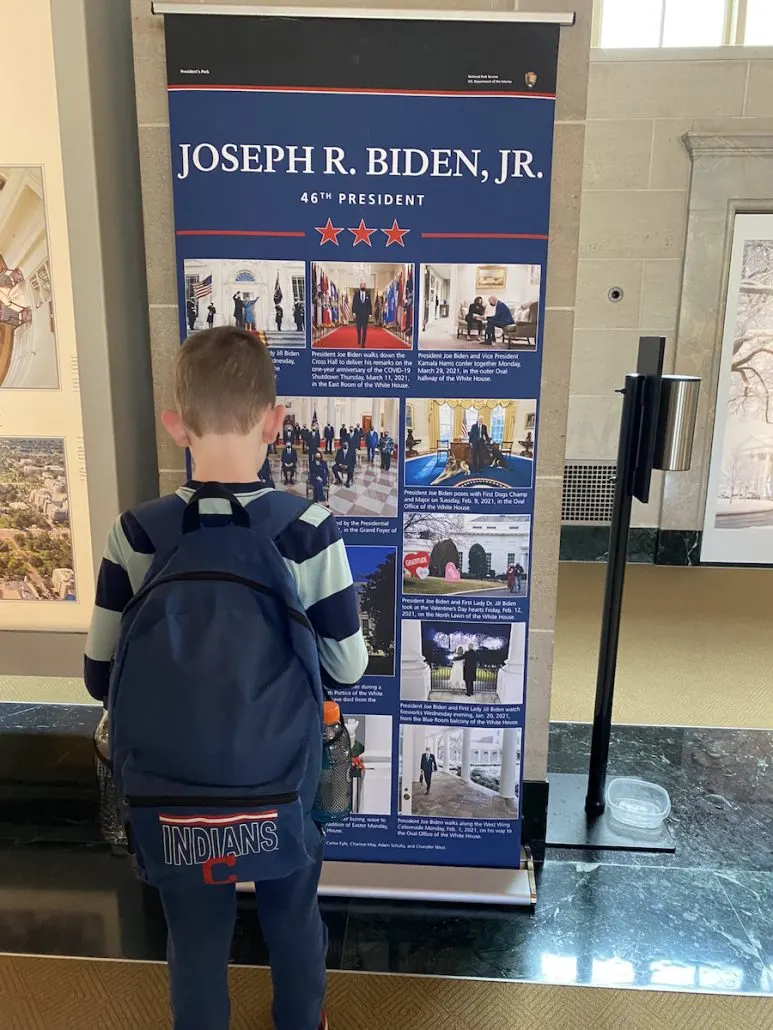 Boy looking at a display at the White House Visitor Center in Washington, D.C.