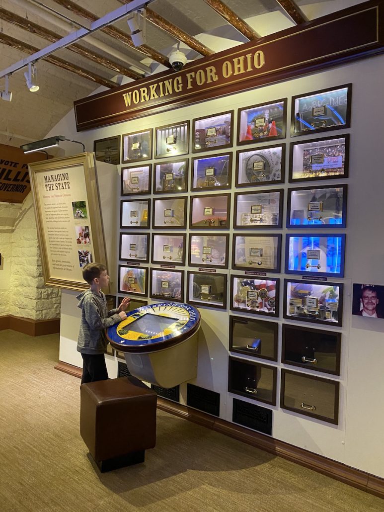 Boy interacting with an exhibit at the Ohio Statehouse in Columbus, Ohio.