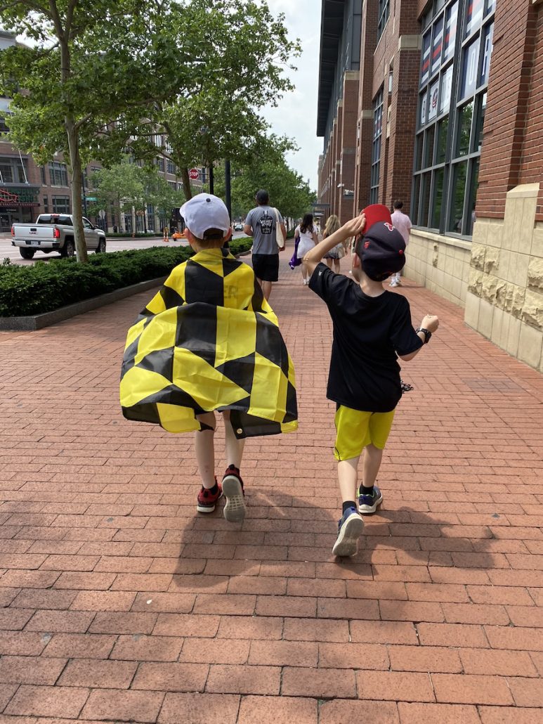 Boys walking in the Arena District in downtown Columbus.