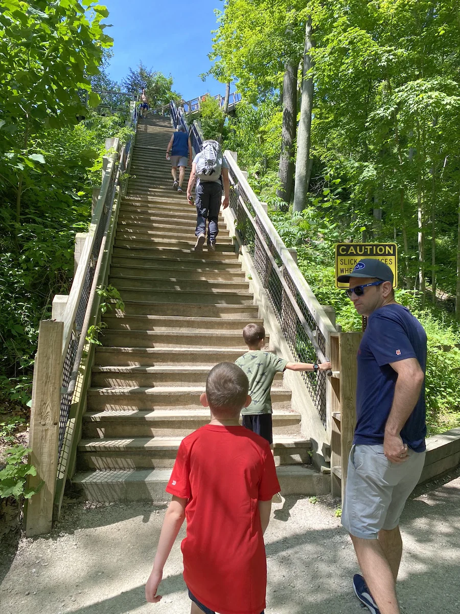 People climbing the Fort Hill Stairs at Rocky River Reservation in Cleveland, Ohio.