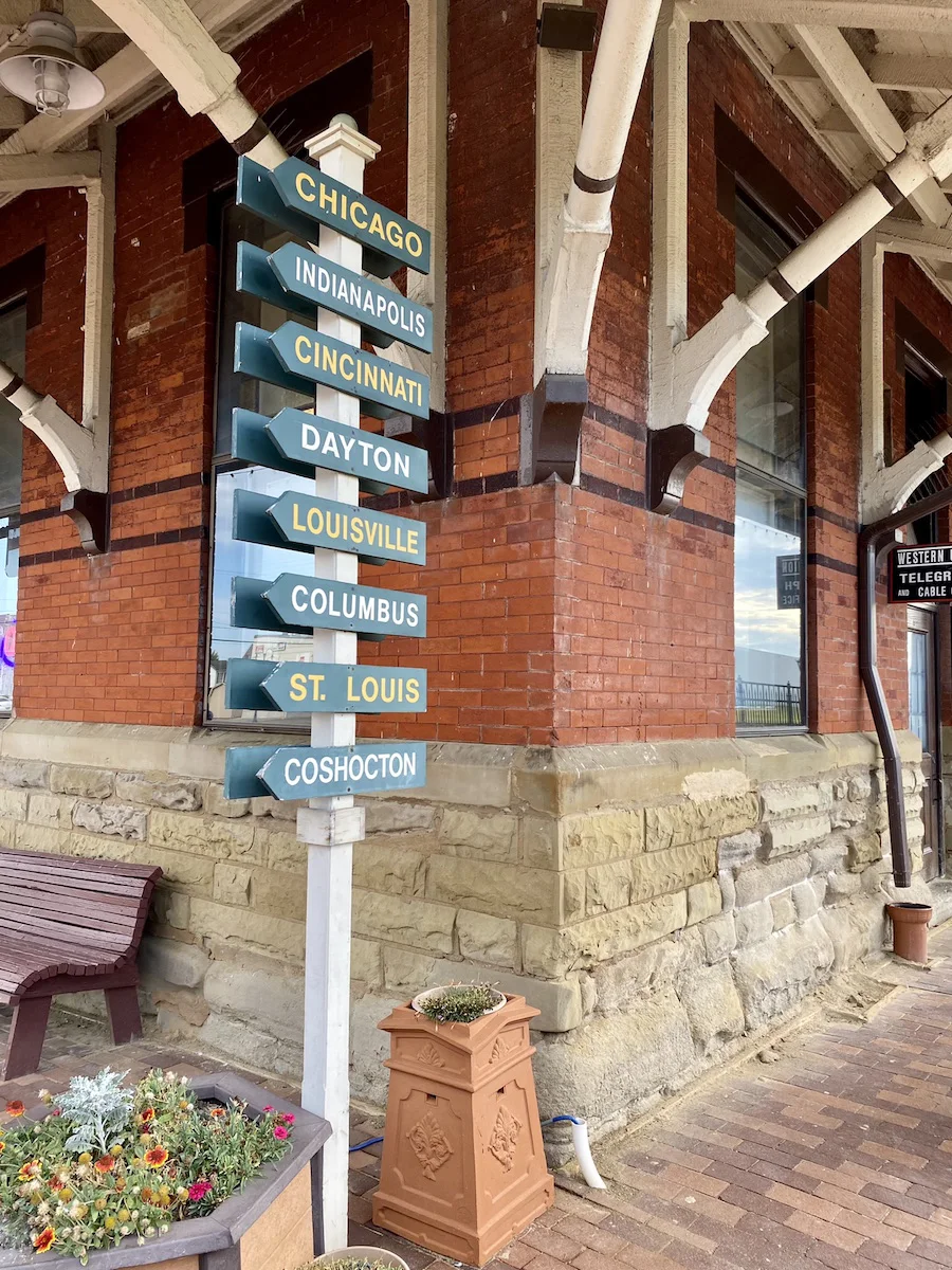 Outside signage at the Dennison Railroad Depot Museum.