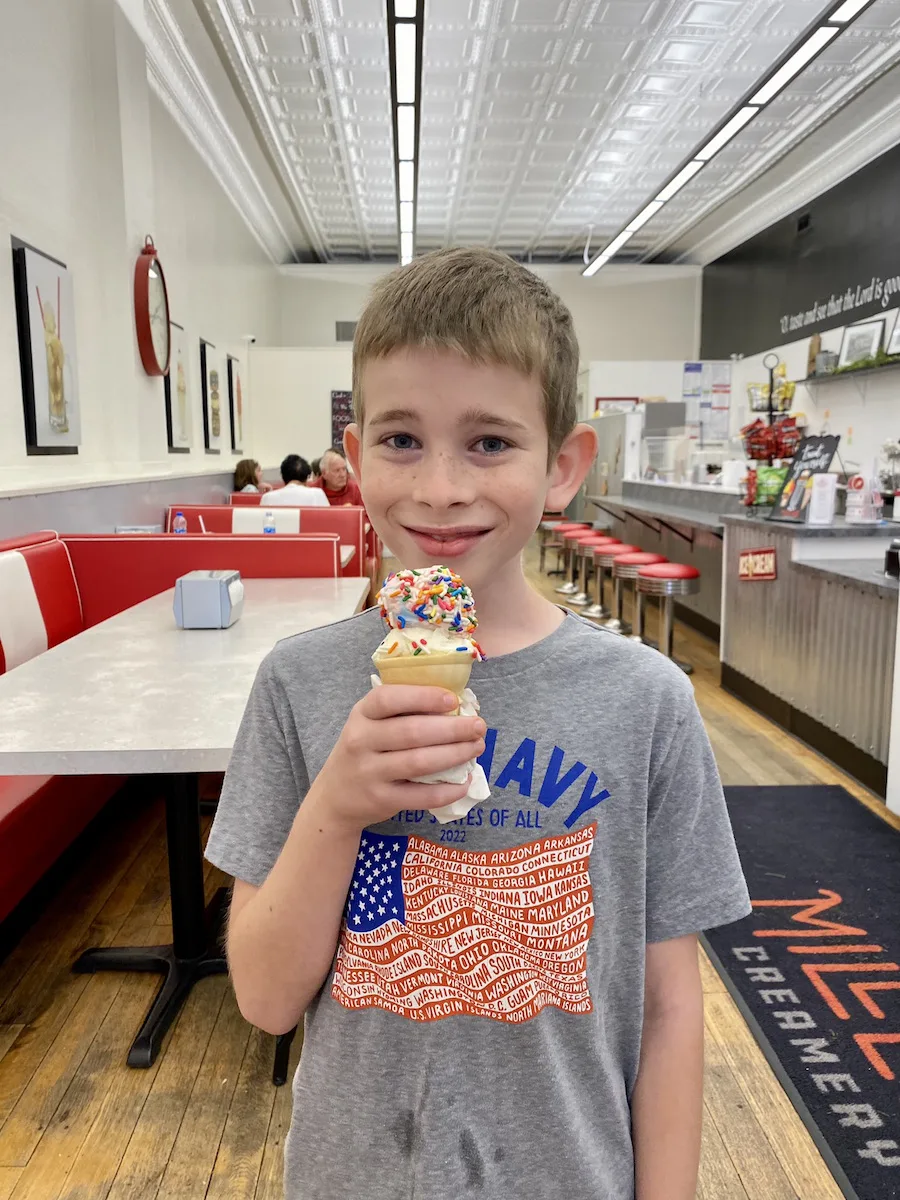 Boy eating ice cream at Miller's Creamery in Tuscarawas County, Ohio.