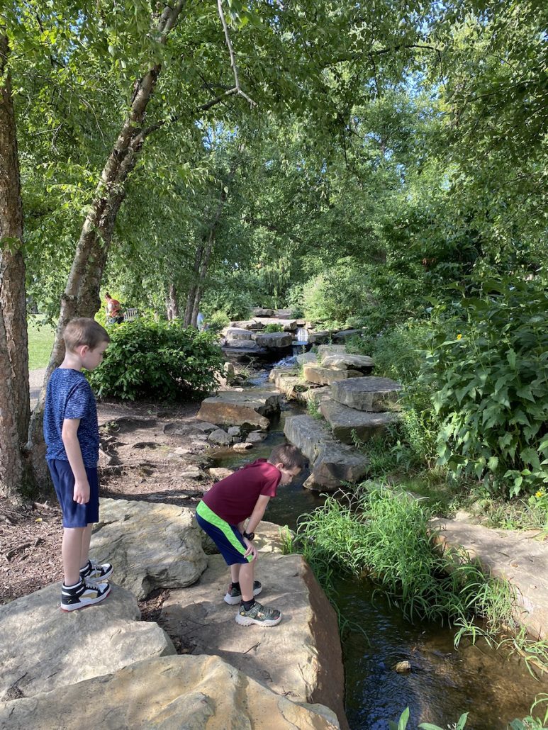 Boys looking at the cascading water at Cox Arboretum in Dayton, Ohio.